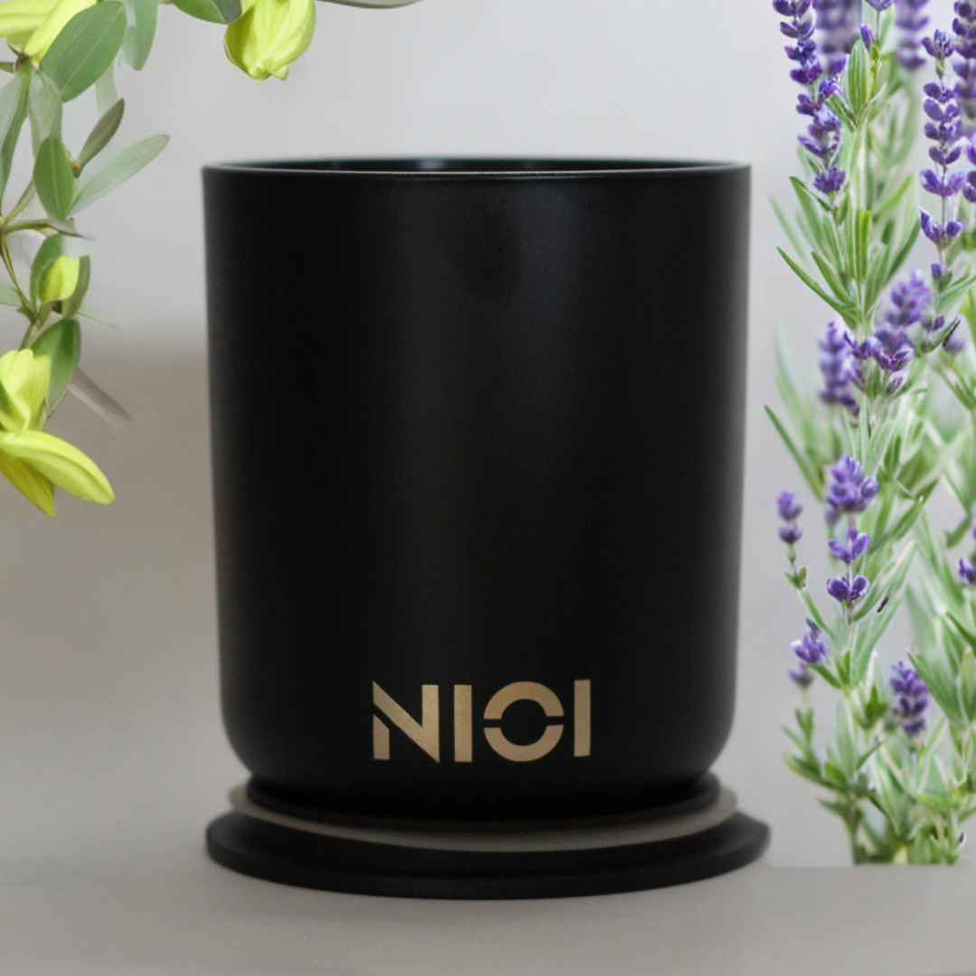 White jasmine and ivy large candle by Nioi 63 Hour burn time Black Vessel Gold logo