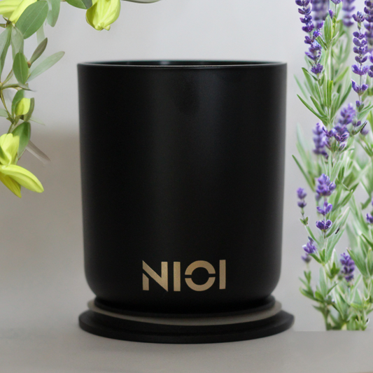 White jasmine and ivy large candle by Nioi 63 Hour burn time Black Vessel Gold logo