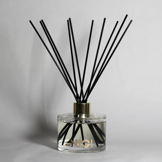 Ylang Ylang and lavender reed diffuser 200ml black reeds gold glass By Nioi 