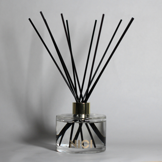 Yuzu reed diffuser 200ml black reeds gold glass By Nioi